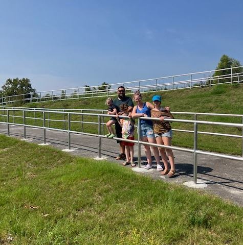 Family standing on ramp